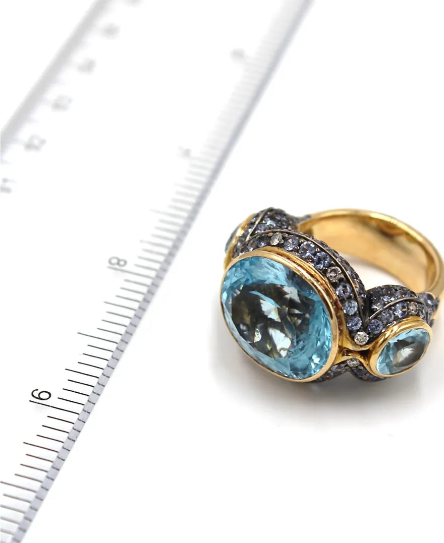 18K Rose Gold and 21.34 Carat Blue Topaz Ring