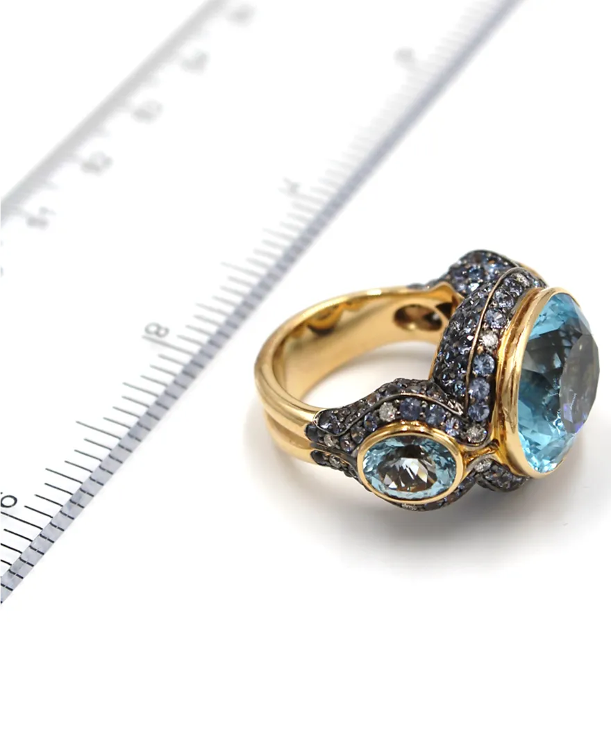 18K Rose Gold and 21.34 Carat Blue Topaz Ring