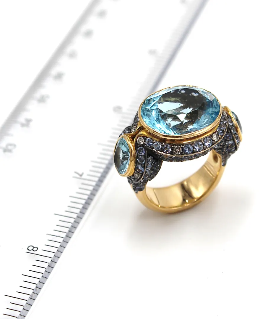 18K Rose Gold and 21.34 Carat Blue Topaz Ring